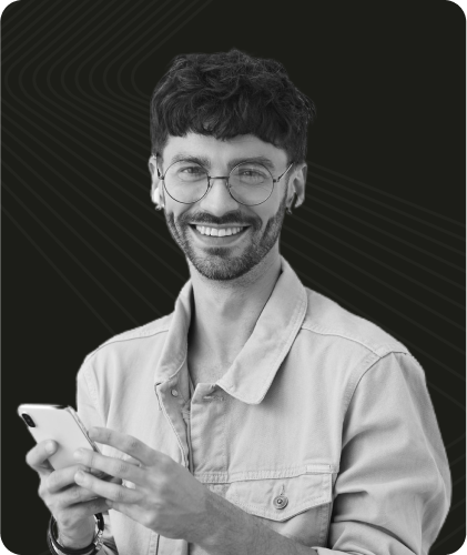 A man holding a phone (dark mode)